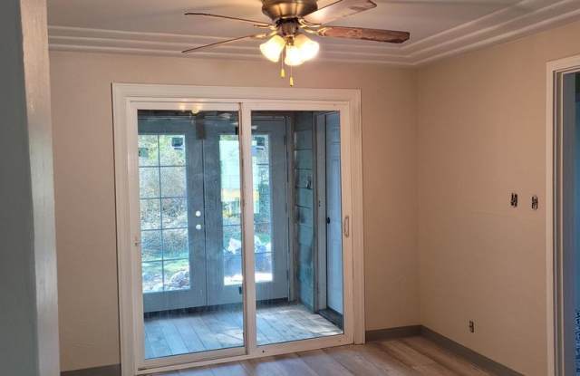 Photo of Supper cute 3 bedroom 1 bath house. This house has lots of charm. The upstairs is one big bedroom. Has a gas fireplace and laundry room