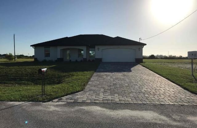 1249 NW 33rd PL - 1249 Northwest 33rd Place, Cape Coral, FL 33993