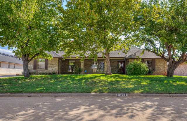 Welcome to your dream home nestled within the highly sought-after Quail Creek! - 11204 Leaning Elm Road, Oklahoma City, OK 73120