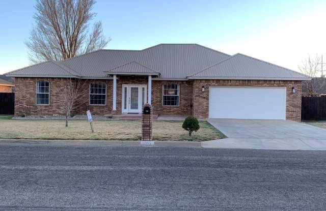 SPECTACULAR HOME LOADED WITH AMENITIES AND UPGRADES - 2105 Howard Cowper Drive, Clovis, NM 88101