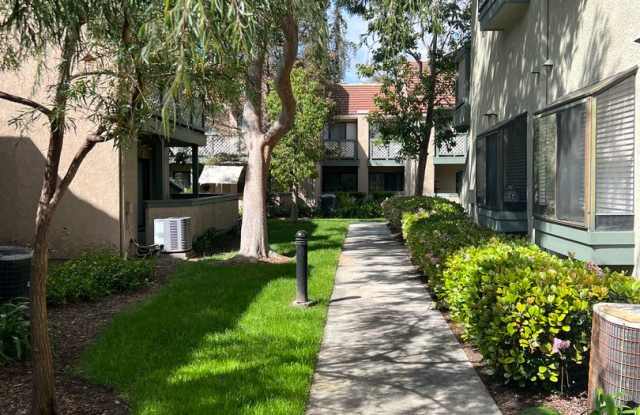 Large 2 Bedroom, 2 Bath Condo with 2 Parking and Community Pool