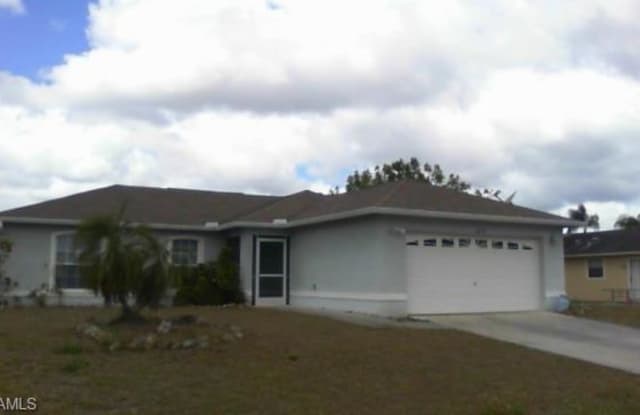 10738 Cocoatree CT - 10738 Cocoatree Court, Lehigh Acres, FL 33936