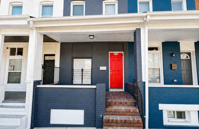 Charming Baltimore Rowhome with Hardwood Floors & Bonus Basement Space