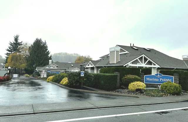 Elegant Gated Townhome with Main-Floor Primary Suite at Marina Pointe Kent