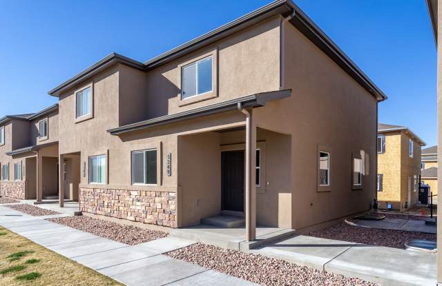 Unveiling Luxury Living: Townhomes with Main Level Office, Dual Master Suites, and Ample Storage Space!