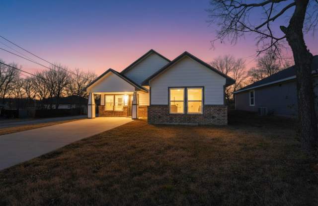 Photo of Bright Corner Lot Home with Open Living and Island Kitchen