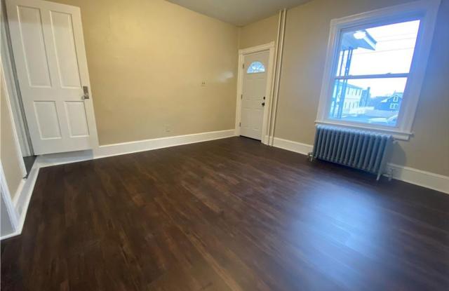 Charming three-bedroom row house available for rent in the desirable Nazareth