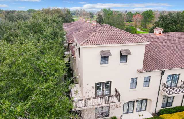Iconic 2 story corner condo at the Terraces of Celebration. Completely renovated 2 Bedroom, 2 Bathroom with second floor Loft and wrap around balcony overlooking the Lake