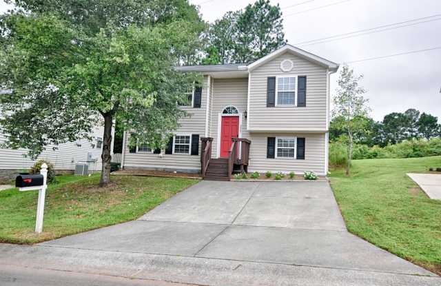 Amazing 4 bed/2 bath split level home conveniently located near RTP with fenced yard!