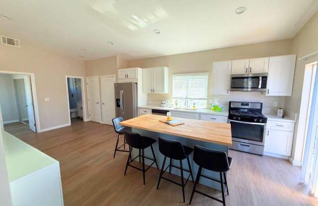 4 BD/2BA Separated Yard and Off Street Parking!