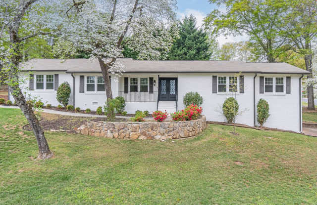 Large 3 bedroom 3 bath two story ranch home within walking distance to downtown Woodstock.