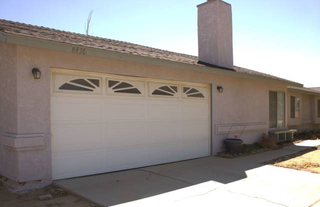 Photo of Charming 3-Bedroom Retreat with Spacious Backyard  Modern Comforts