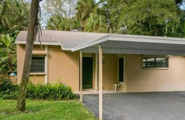 4977 VILLAGE GARDENS DRIVE