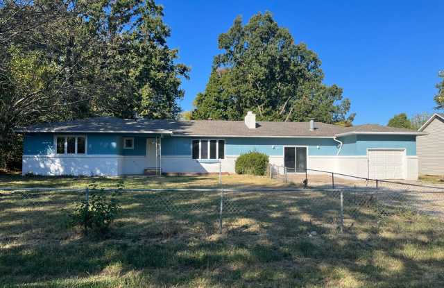 Photo of Flexible 4-Bedroom Home with Fenced Backyard