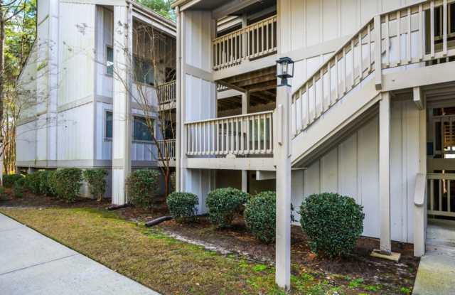 **Light-Filled Condo with Designer Finishes ✨ | Screened Porch
