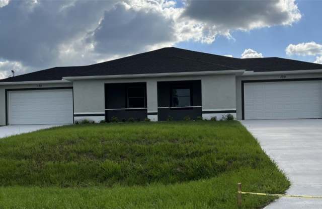 136-138 Harry Avenue S - 136 Harry Avenue South, Lehigh Acres, FL 33973