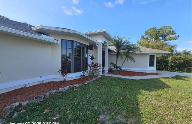 A fantastic 3/2 single-family home with a beautiful pond view and a cozy fireplace welcomes you