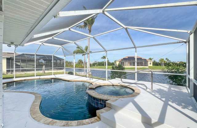 Cape Coral Pool Home with Canal! - 2615 Northwest 1st Street, Cape Coral, FL 33993