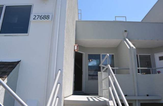 BEAUTIFUL "HILLCREST VILLAGE" CONDOMINIUM HOME WITH GARAGE