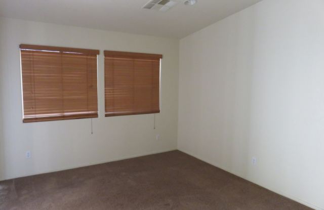 Huge family room with kitchen nicely tucked in the middle.