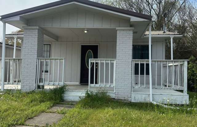 3BR/2BA Home with Covered Porch & Expansive Lot