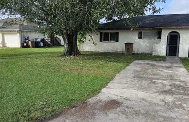 702 Gilbert Ave S - 702 Gilbert Avenue South, Lehigh Acres, FL 33973