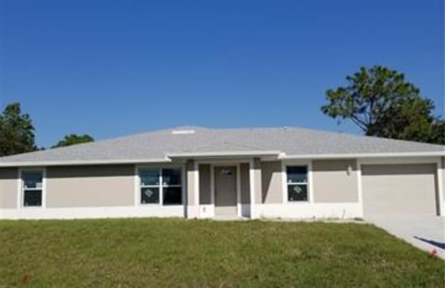 2428 Mansfield AVE S - 2428 Mansfield Avenue South, Lehigh Acres, FL 33973