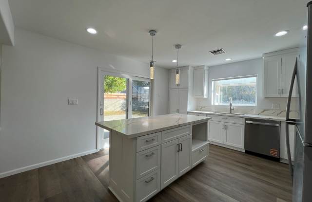 Fully remodeled Reseda 3+2 home w/solar panels to help lower your utility costs!