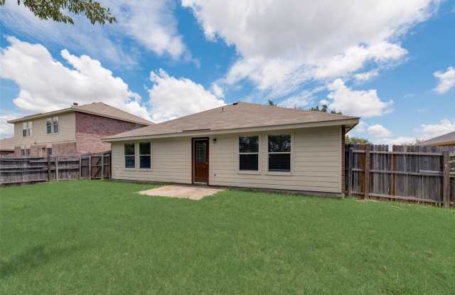Brand-new, light-filled home featuring a spacious layout with a three-way split bedroom design, ceramic-tile entry, large backyard views from key living areas, built-in storage, and a second bath with an extra-deep tub/shower combo.