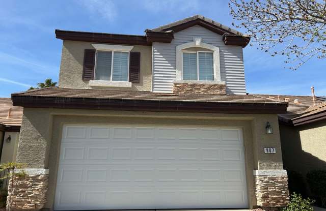 BEAUTIFUL TWO-STORY TOWNHOME IN A GATED COMMUNITY