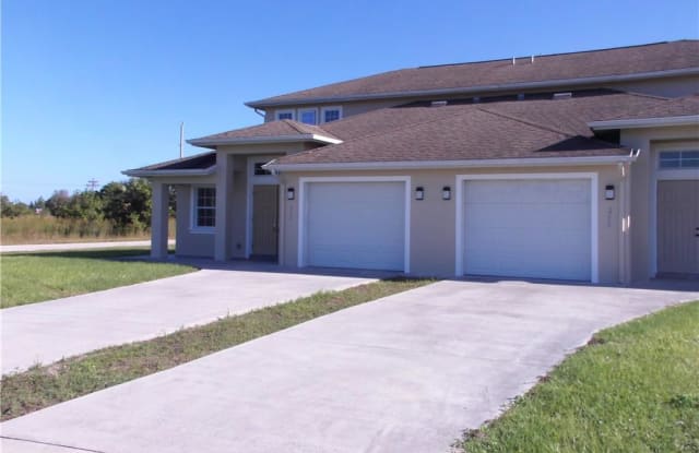 240 Patio CIR - 240 240/242 Patio Cir, Lehigh Acres, FL 33974