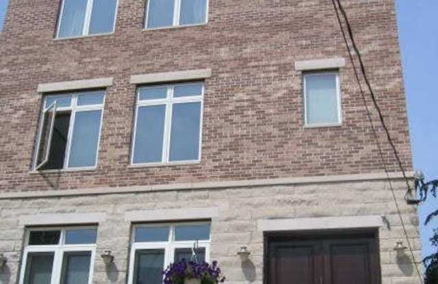 Beautiful modern living in the Brady St. Area