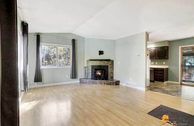 Eagle River Home w/ Fenced Yard, Sunroom, and Garage!