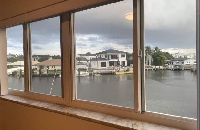 698 NE Spanish River Boulevard unit: 23