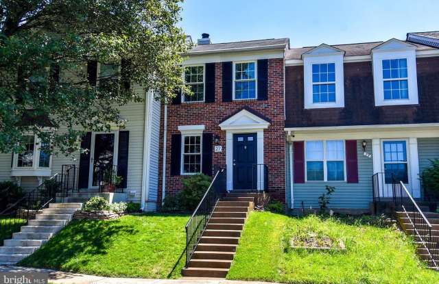 Welcome to this beautifully presented brick front residence in the desirable Countryside community, where style and comfort come together effortlessly.