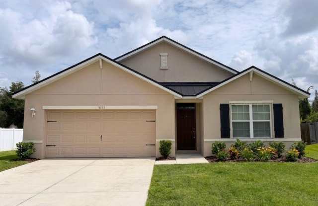 Single Family Home In SW Cape Coral - 4 Bedroom 2 Bath 2 Car Garage!