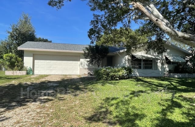 1433 Covington Cir W - 1433 Covington Circle West, Whiskey Creek, FL 33919