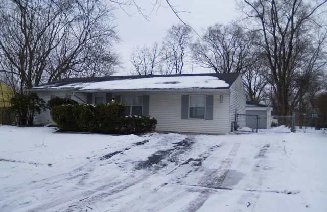 Charming 3-Bedroom Home with Spacious Yard and Detached Garage