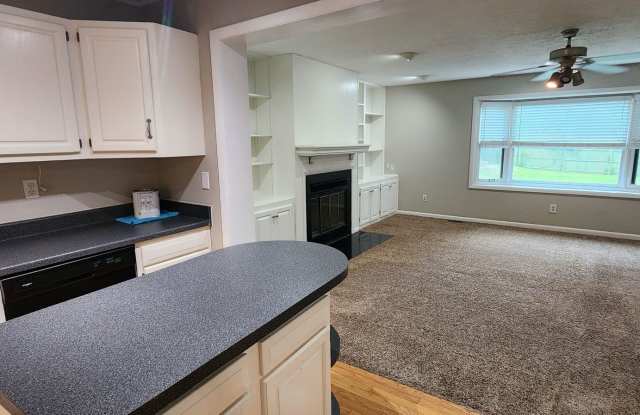 Photo of Check This One OUT!! To View is to Rent! 3 Bedroom, 1 Bath. Hardwood Floors, Tile and Newer Carpet throughout! Fenced in Backyard, with Storage Shed! Backs up to Warwick Park!