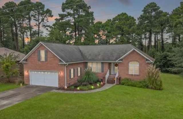 **Stately Brick Home in Fairfield Harbour | Tray Ceiling, Column, Bonus Room & Screened Porch**