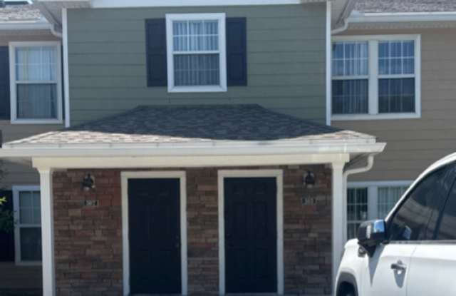 Photo of 303 Lighthouse Road Great location for this 4 bedroom, 3 bath townhouse