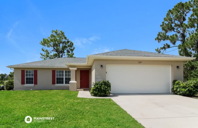 1235 Bayou Street East - 1235 Bayou Street, Lehigh Acres, FL 33974