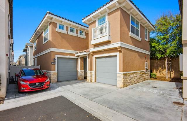 NEW LISTING 4 Bedroom, 3 Bathroom, 2 Garage Detached Condominium, with HVAC, Tankless Water Heater, and Private Patio