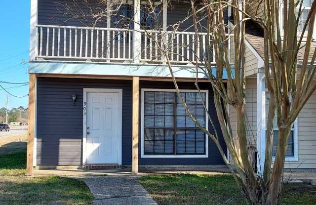 903 E. Tom Stokes