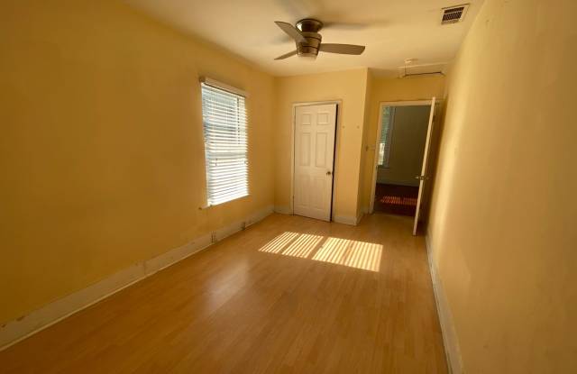 Photo of Charming  Updated 3 BR / 2 BA House Downtown  Walking Distance to the University of TX / Wood Floors