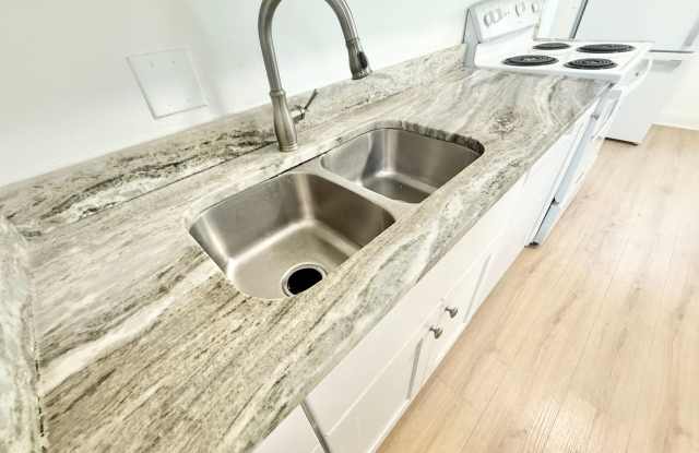 ***RENT READY~4 Bed RENOVATED 2 story house/w/ downstairs bedroom/Granite countertops