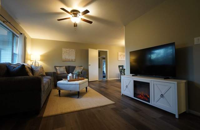 4 Bedroom 2 Bathroom FULLY FURNISHED Home with Fenced in Backyard and 2 Car Garage- UTILITIES INCLUDED