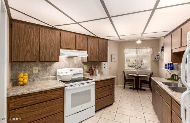 10913 W COGGINS Drive