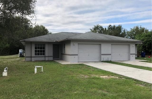 438 Bell BLVD S - 438 Bell Blvd S, Lehigh Acres, FL 33974