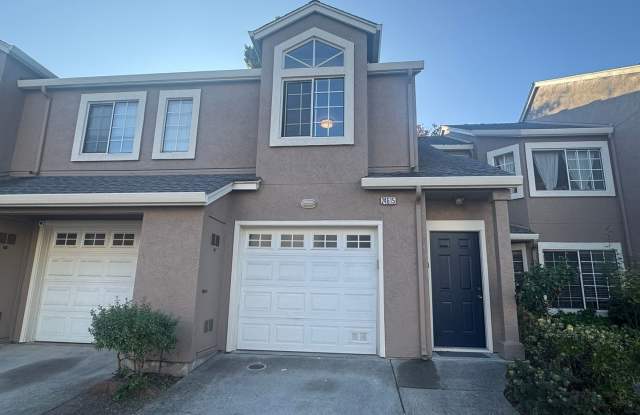 Photo of Charming top-level 2-bedroom, 1-bath condo in a highly desirable gated community.